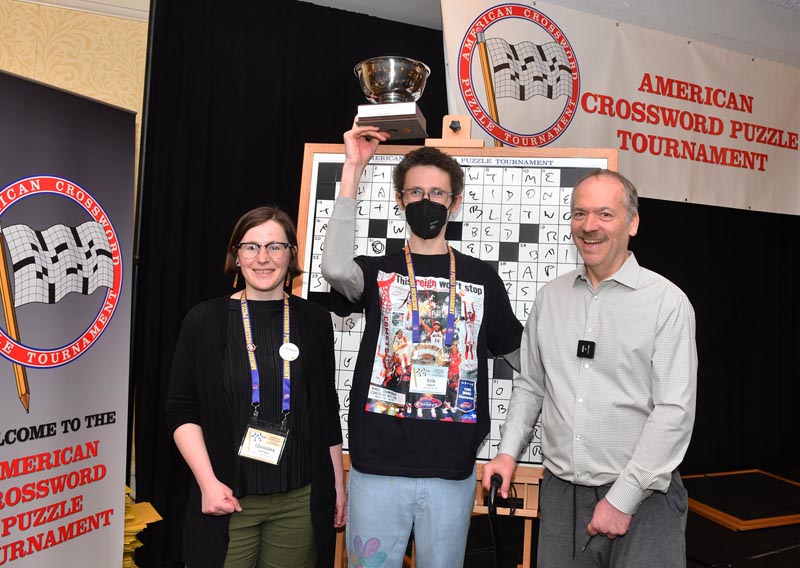 ACPT 2026 Champ Erik Agard with Puzzle 8 constructor Christina Iverson and Tournament Director Will Shortz